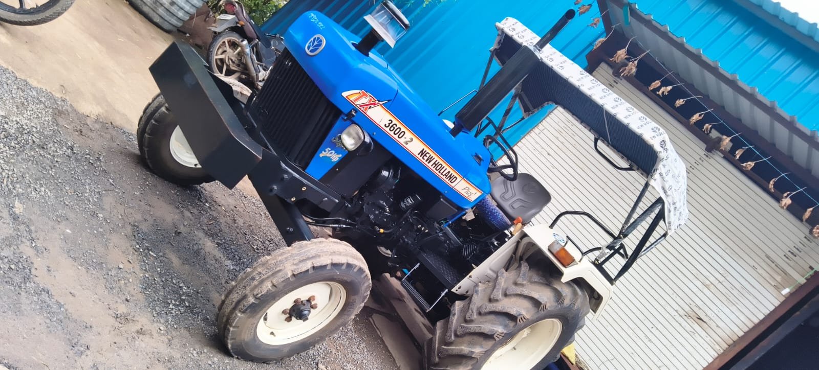 NEW HOLLAND MODEL